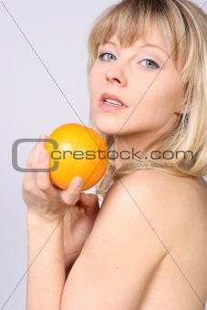smiling woman with orange