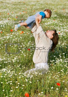 mother and son playing outdoors