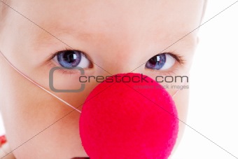 Baby with clown nose