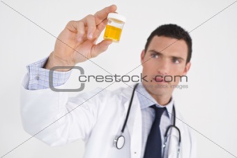 Concerned Doctor With Sample