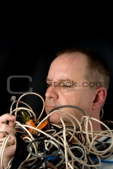 Man Tangled in Wires