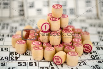 Wooden counters of bingo on cards
