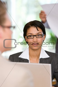 businesswoman talking to client