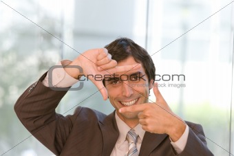 portrait of young confident business man in focus