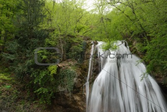 picturesque stream of falling water