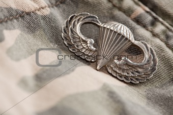 Paratrooper War Medal on a Camouflage Material.