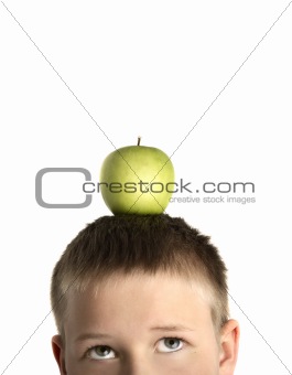boy with apple on his head
