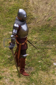 Armoured knight with swords