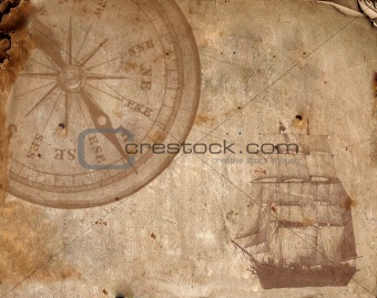 Compass on the old paper 