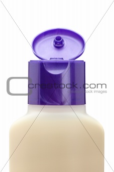 Opened plastic bottle with soap or shampoo