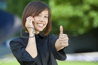 Beautiful Oriental Woman On A Cell Phone