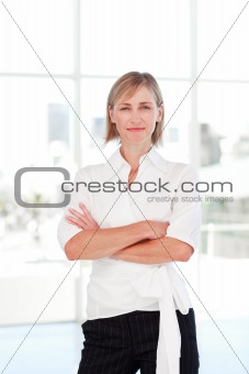 Serious businesswoman with folded arms