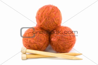 Balls of Yarn with Knitting Needles