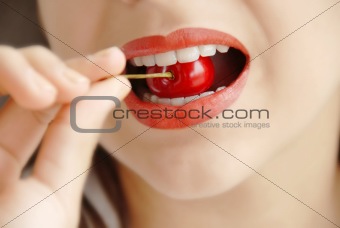 Eating red cherry