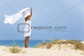girl in white by the sea
