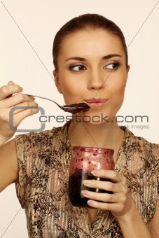 woman eats jam