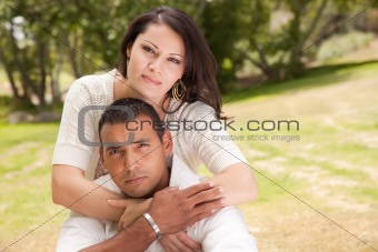Affectionate Happy Hispanic Couple in the Park.