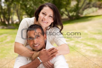 Affectionate Happy Hispanic Couple in the Park.