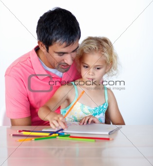 Father and daughter writing together