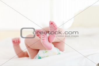 Baby lying in bed