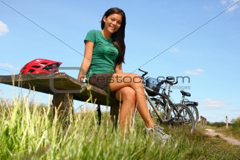 Woman resting from biking