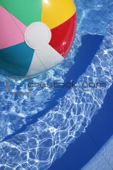 Beachball in a beautiful blue swimming pool