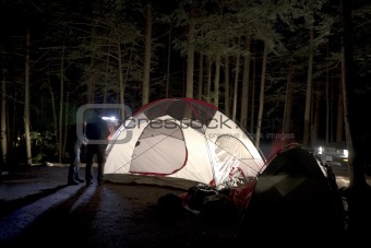 Putting Together Tent at Night