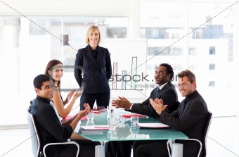 Business people applauding in a presentation