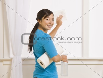 Attractive Asian Female Cleaning Window