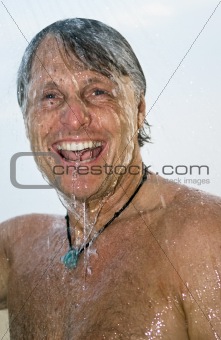 man under shower