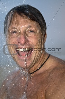 man under shower