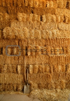 golden straw bales wall and tools