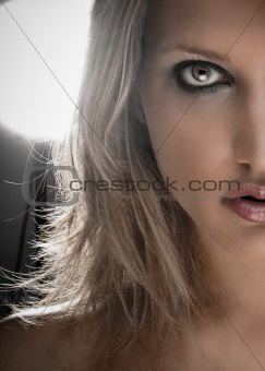 Half Face Portrait Of A Beautiful Blond Woman