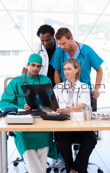 Group of doctors studying an X-ray