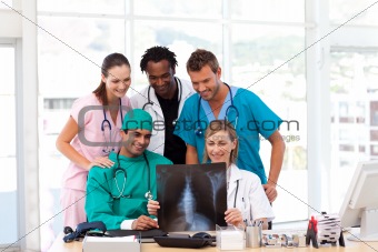 Medical team examining an X-ray