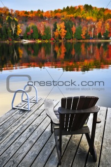 Wooden dock on autumn lake