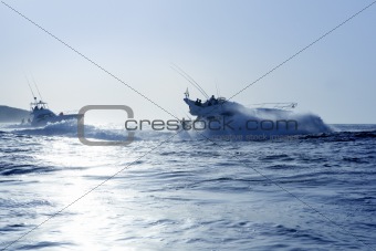 Fishing boat in a big game summer blue morning
