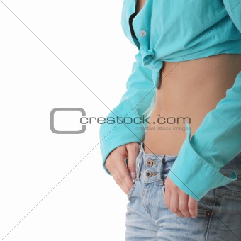 Sexy, fit woman in jeans, with naked stomach 