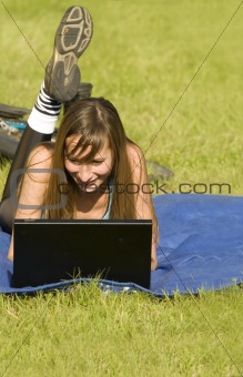 Student with laptop outdoor