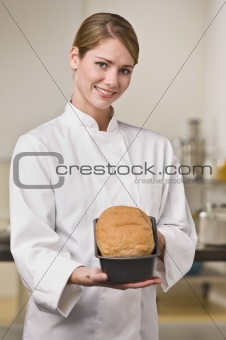 Baker with Loaf of Bread