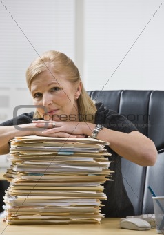Woman in Office with Paperwork