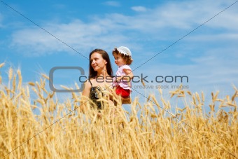 Motherand daughter in a wheat field