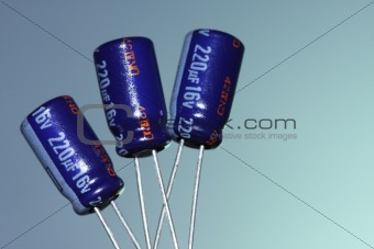 Three electrolytic capacitors