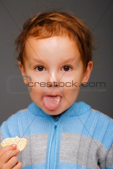 Boy showing his tongue