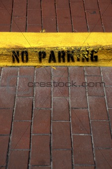 No parking sign on kerb 