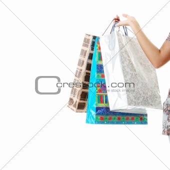 Hand holding shopping bag