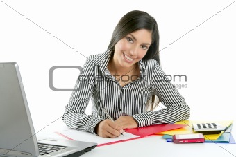 Beautiful secretary businesswoman writing on desk