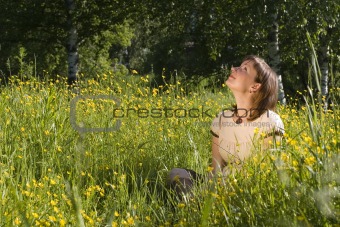 Woman in yellow flowers