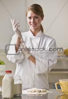Pastry Chef Putting On Gloves