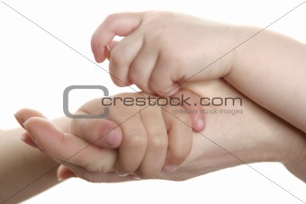 Mother and son, daughter hand together